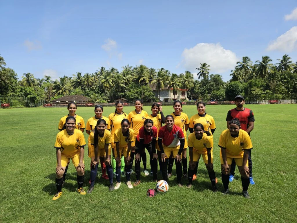 A VMSIIHE student football team on the campus sports field