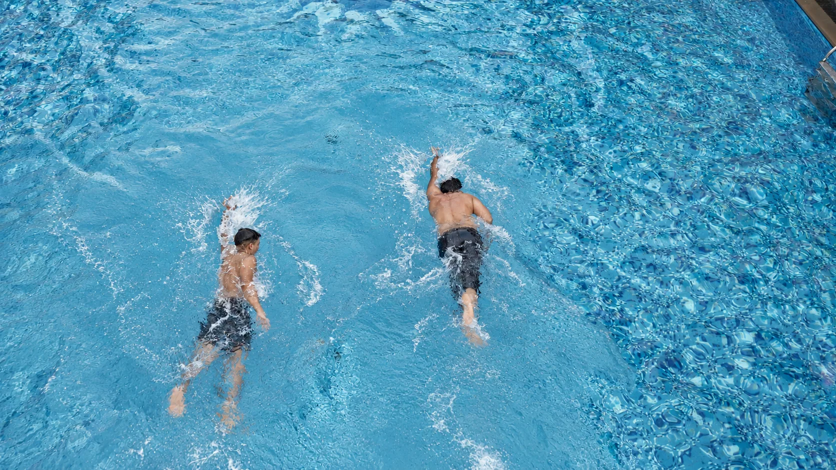 Swimmers exercising in a pool